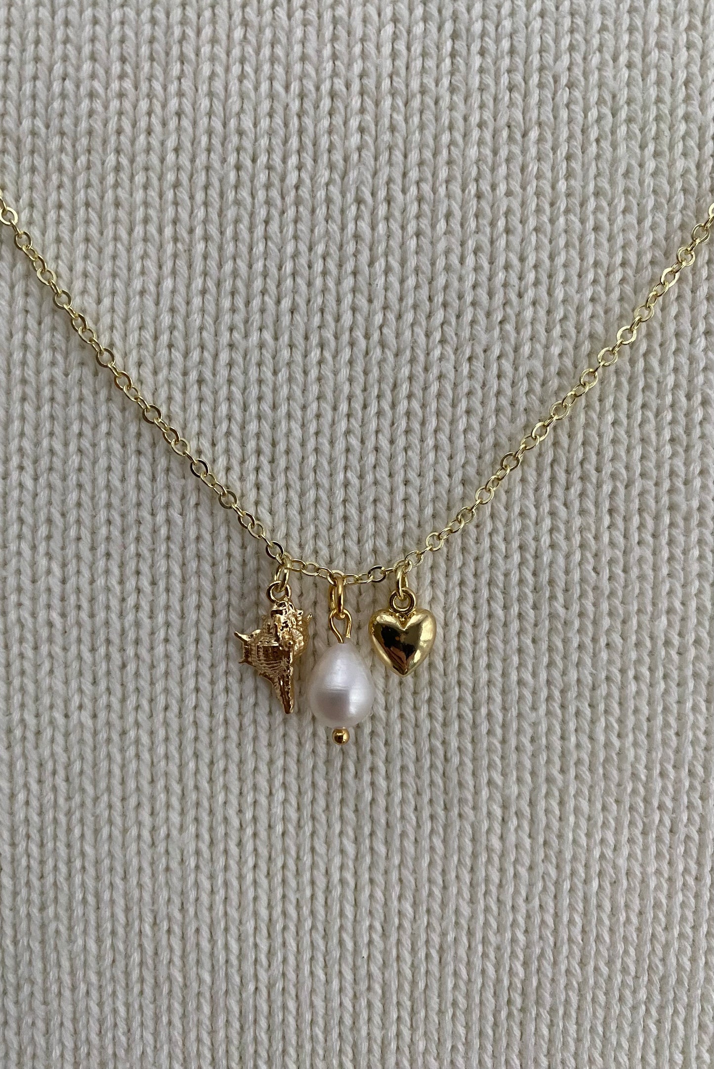Gold charm necklace