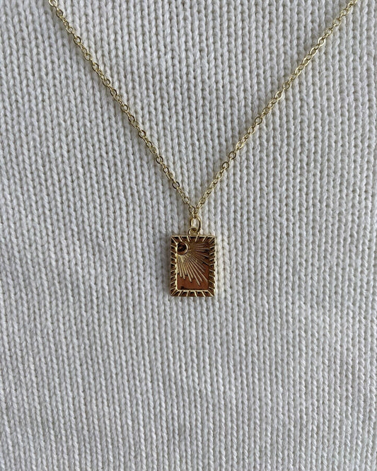 Gold sun burst necklace