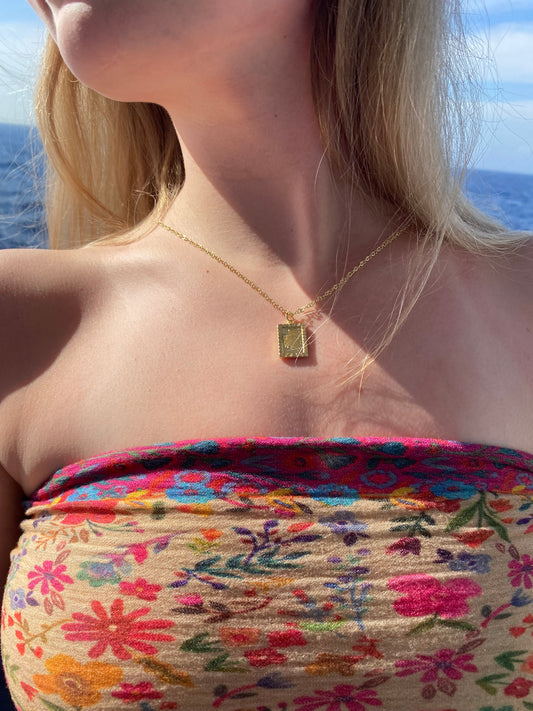 Gold sun burst necklace