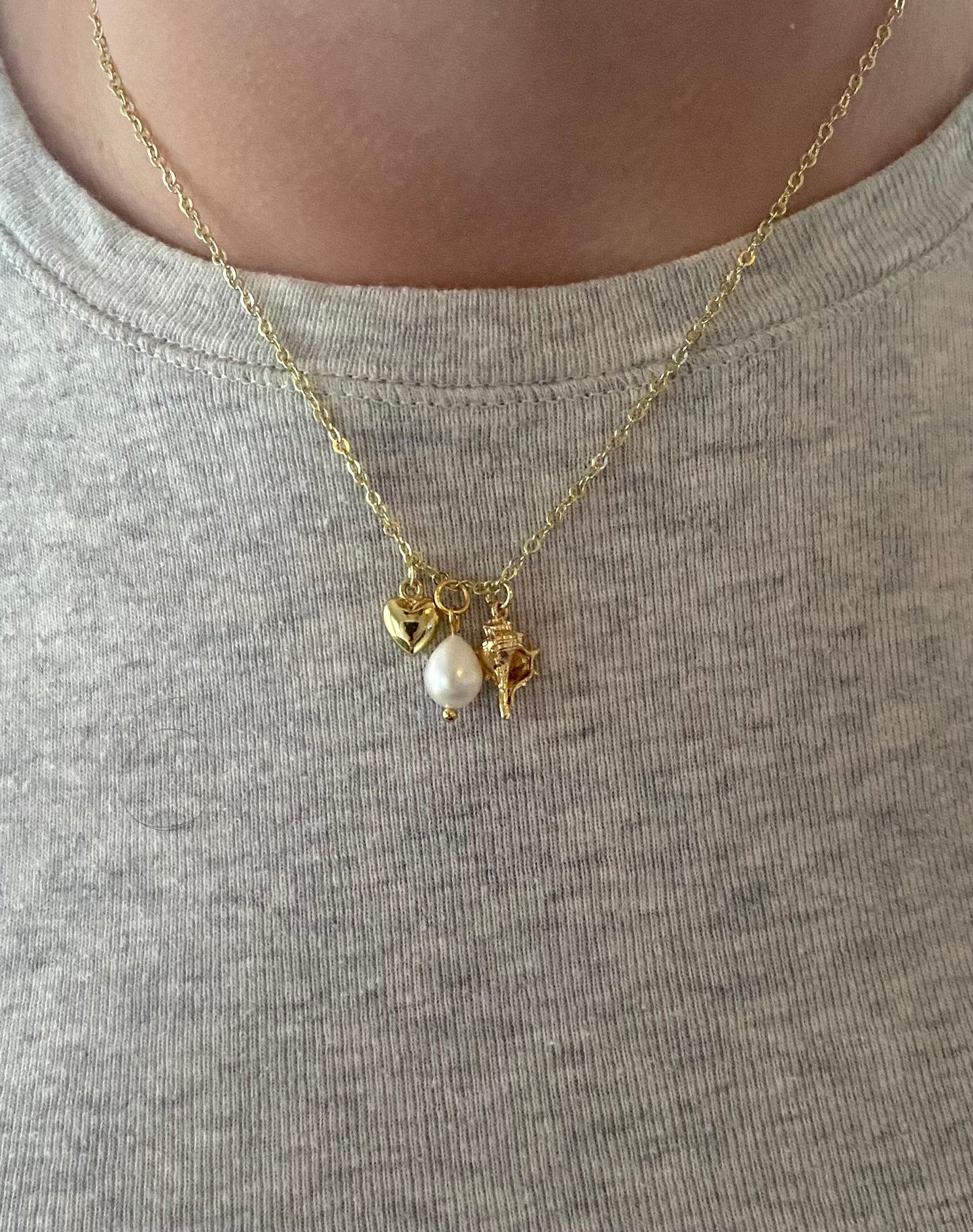 Gold charm necklace